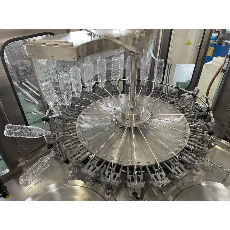 Automatic soft water mineral water juice pet bottled mineral water cleaning and filling/bottling screw cap three-in-one machine