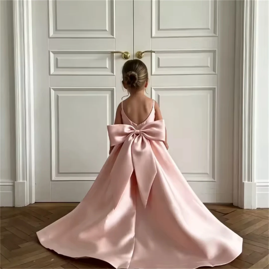Pink Satin Flower Girl Dress Floor-Length Formal Gown with Back Bow Design Featuring a Bow-Adorned Full Skirt Ideal