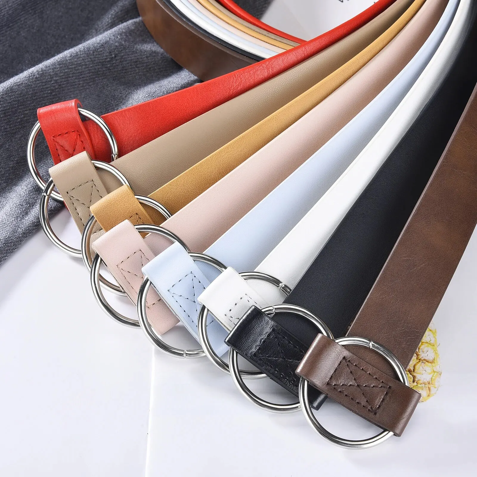 Cintura da donna Cintura non perforata alla moda con fibbia rotonda semplice Cintura casual in vera pelle PU con gonna Pantaloni Jeans Cintura da donna