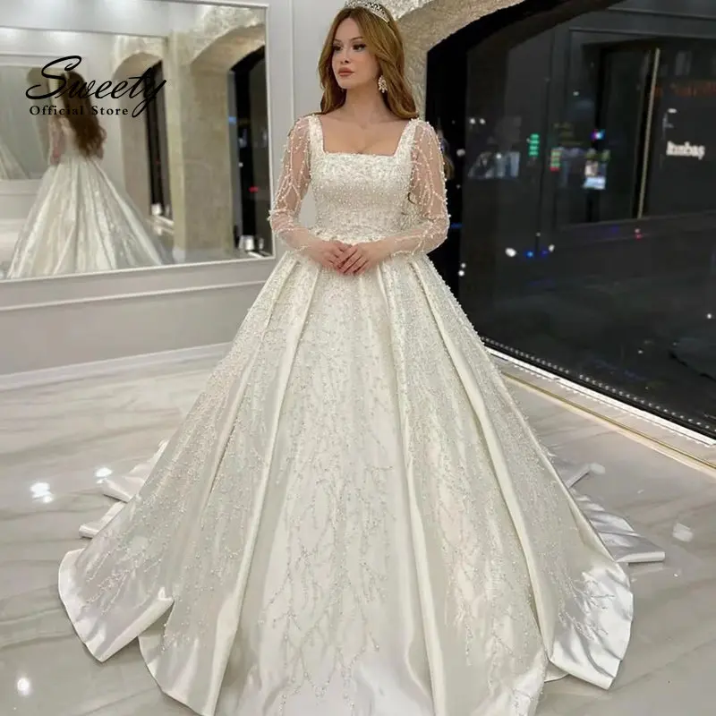 Vestido De Novia De lujo con cuentas De encaje bordado, Vestido De baile De princesa, cuello cuadrado, manga completa, botón De Novia