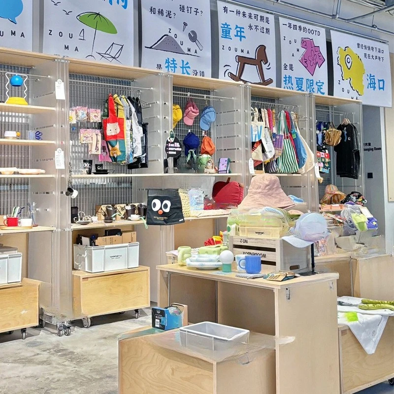 Rak pajang lantai toko pakaian baru yang kreatif, rak lantai papan laut sumbu optik, etalase tas sepatu akrilik