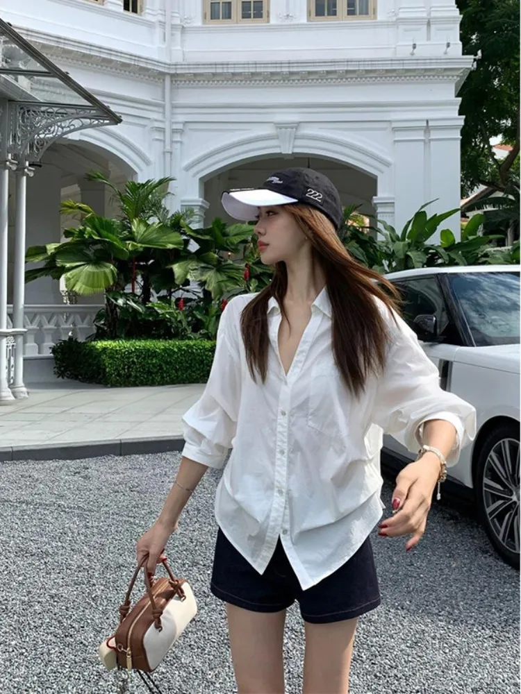 

Korean Sle Long Sve V-Ne Slimming irt Women's Early Spring Faion Bubble Sve Waist-Cinching Commute Top