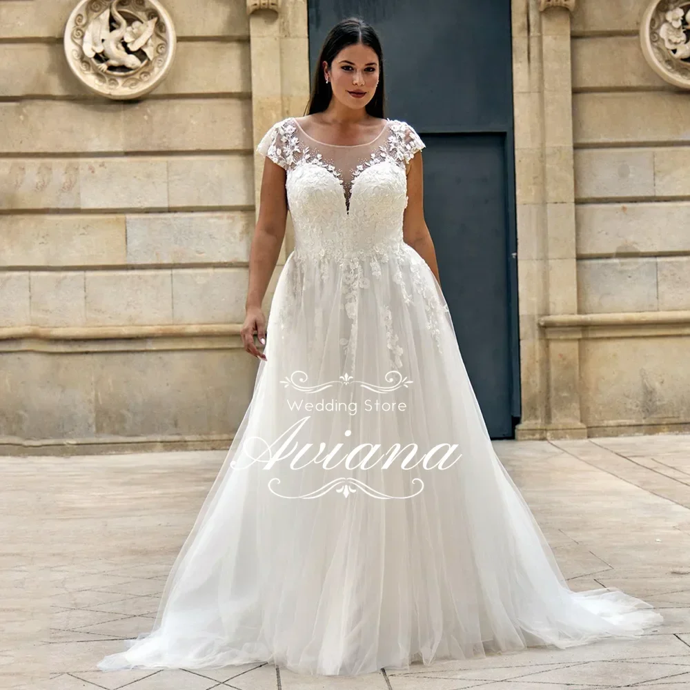 Illusion Round Neckline Cap Sleeve Lace Wedding Dress Floral Applique Bodice Tulle A Line Ball Gown Skirt with Sweep Train