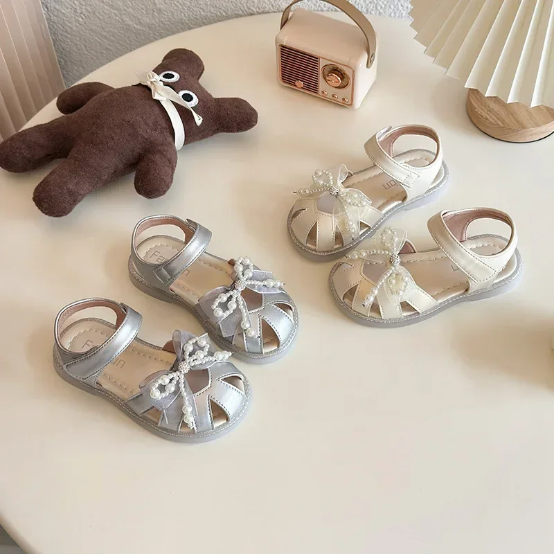 

Girls Sandals for Summer Lace Bows Kids Beach Shoes Hollowed-out Soft Versatile 2025 Brand New Children Princess Shoes Non-slip