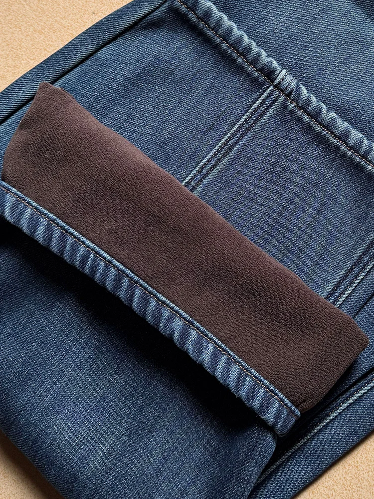 Calça jeans feminina de perna larga da moda americana de inverno com design de zíper inclinado