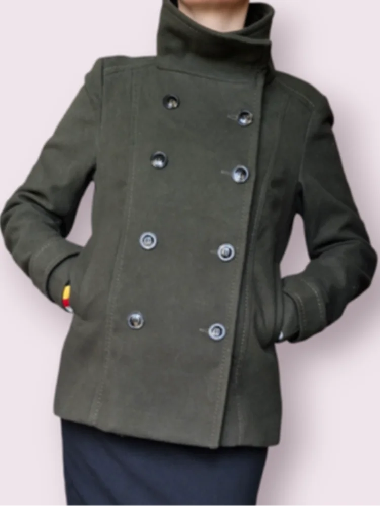 

Casual Woolen Double Breasted Coat Women Solid Stand Collar Pocket Straight Lady Coats 2025 Autumn Winter Fashion Outwear Female