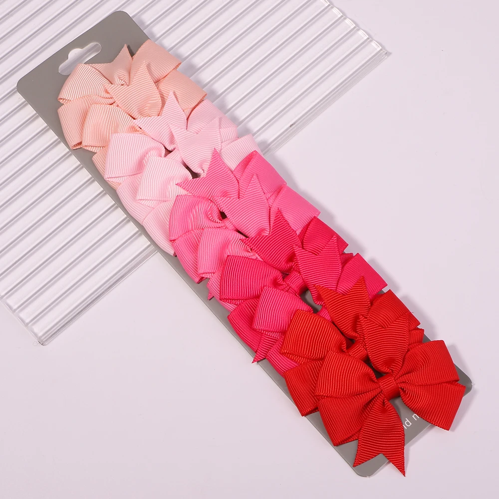 10 pz/lotto simpatici fiocchi per capelli in tinta unita con clip per bambini ragazze fermagli per capelli con nastro in Grosgrain mollette accessori per capelli copricapo