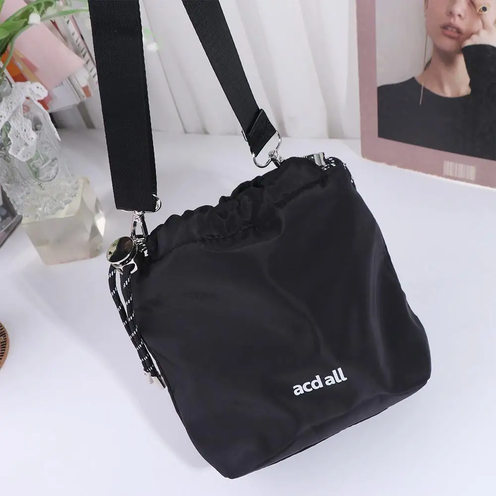 

Simple Korean Style Black Drawstring Bucket Bag Portable Nylon INS Shoulder Bag Luxury Fashion Crossbody Bags Travel