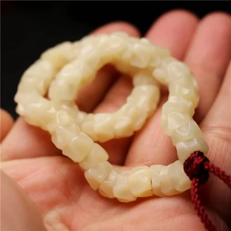 - beads , Tibetan-style bracelet, high-density bone carving, passion seed intestine Bud