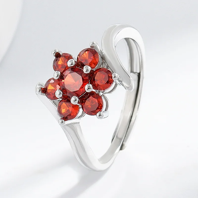 Stilvoller und eleganter Damenring aus 925er-Sterlingsilber mit leicht eingelegtem Zirkon-Granat-Blumendesign