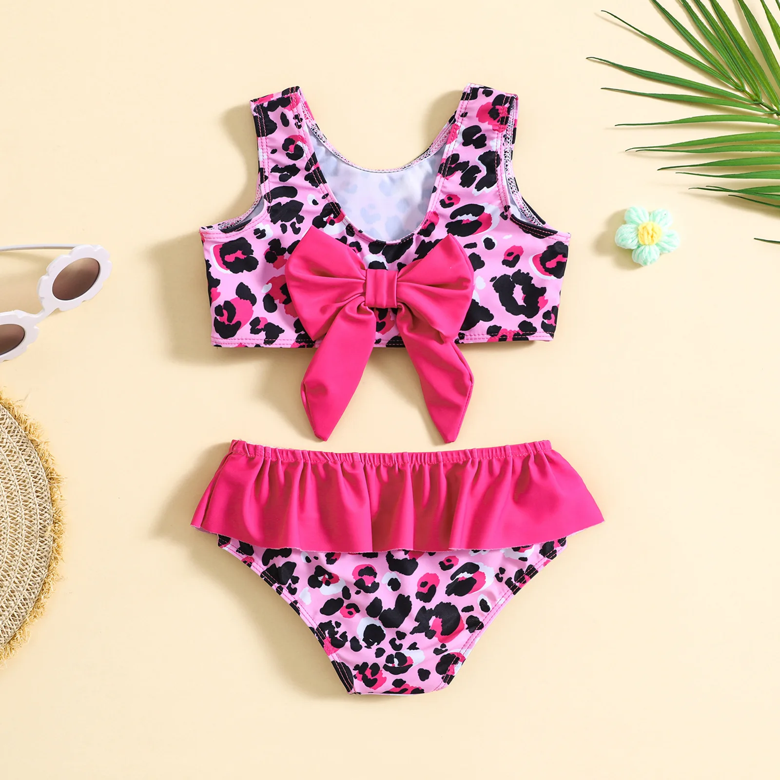Baby two piece swimsuit with pink leopard print and big bow,skirted bottom,suitable for seaside and pool play