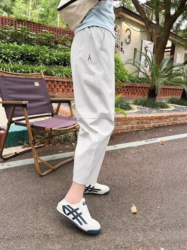 

Ледяной шелк Qui Dry Спортивные брюки Женские летние новые свободные брюки большого размера с защитой от солнца Harlan Light Thin Nine Points Casual Pants