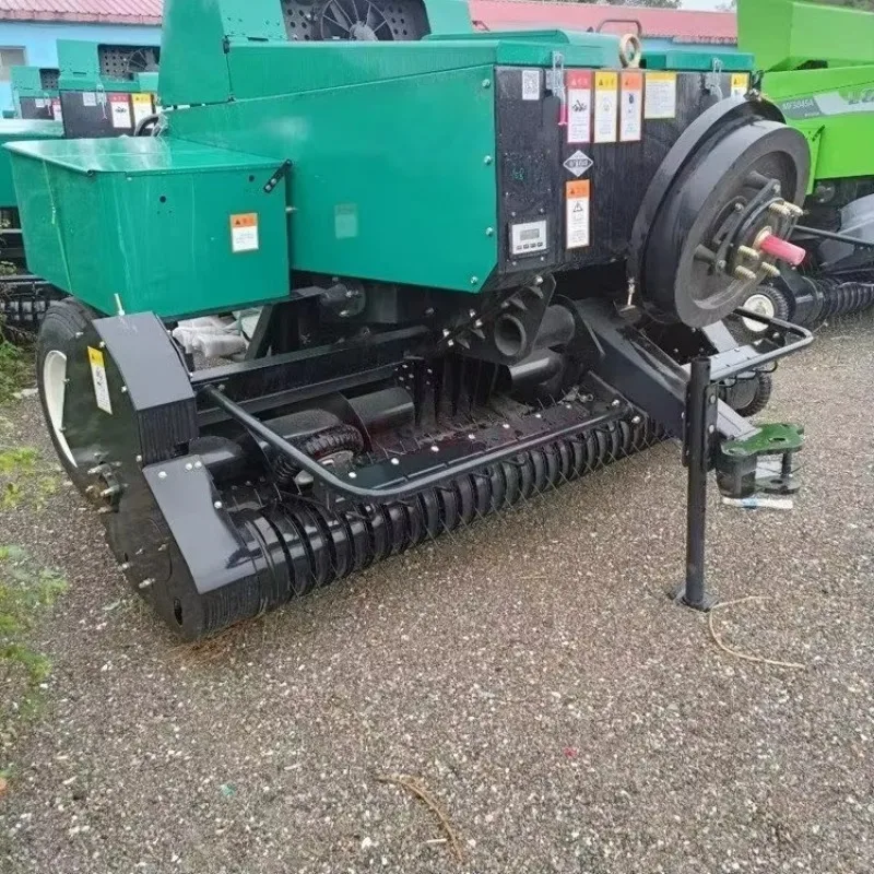 Hay Picking and Baling Machine with a Picking Device It Can Collect Dry hay Laid Out in Strips in the Field and Perform Baling