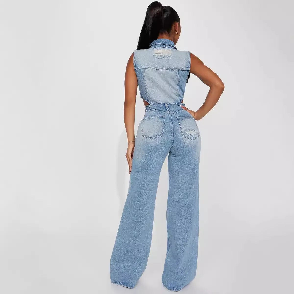 European American Sexy Hollowed-out Design Sleeveless Lapel Denim Jumpsuit. New Fashion Straight-leg Jumpsuits for Women Spring