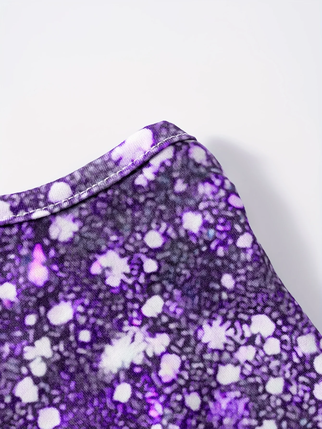 This round neck spaghetti strap maxi dress features a dazzling purple glitter butterfly print on a sleek black base. Soft and fl view 5