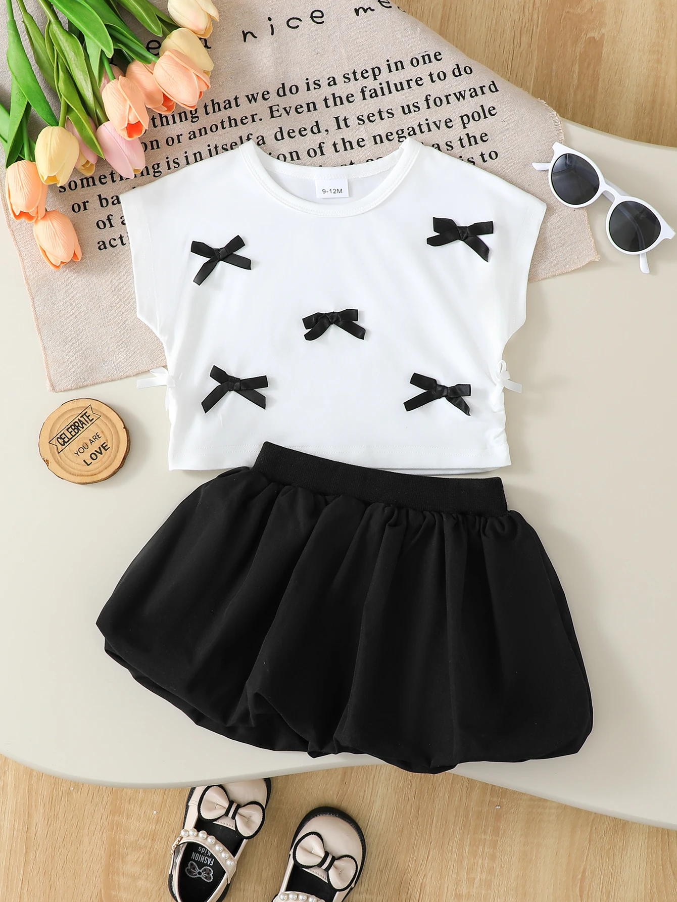 conjunto-de-roupas-de-verao-para-bebes-meninas-2-pecas-sem-mangas-top-decorativo-com-laco-saia-curta-preta-adequado-para-meninas-de-0-a-3-anos-roupas-fofas-da-moda