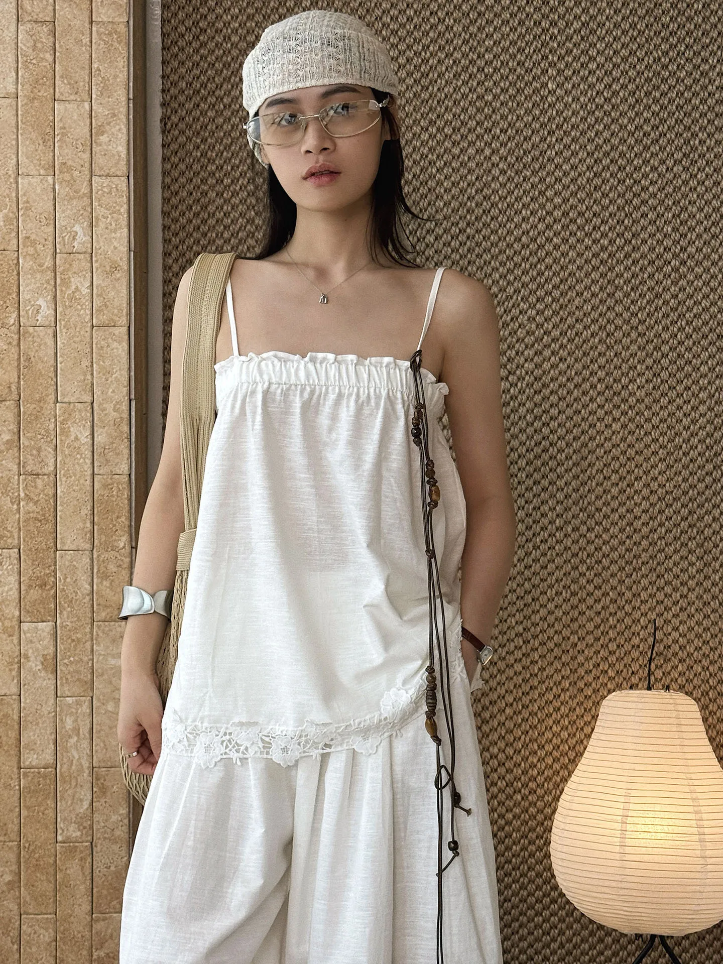 Summer new Paris lace patchwork elastic collar tassel suspender slimming top for women