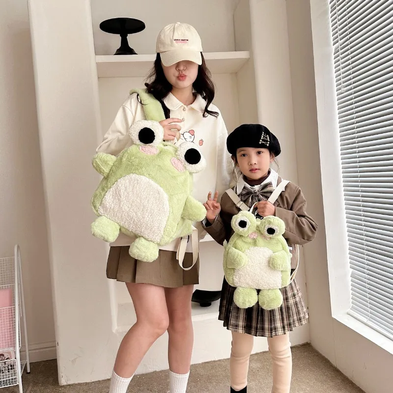 

Новый плюшевый рюкзак с лягушкой, мультяшная кукла, сумка на плечо, универсальная школьная сумка, забавный привлекательный рюкзак для родителей и детей для девочек