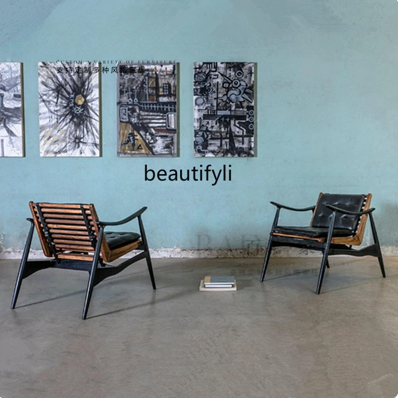 

Medieval light luxury designer creative solid wood sofa chair leather art leisure chair hotel office negotiation single chair