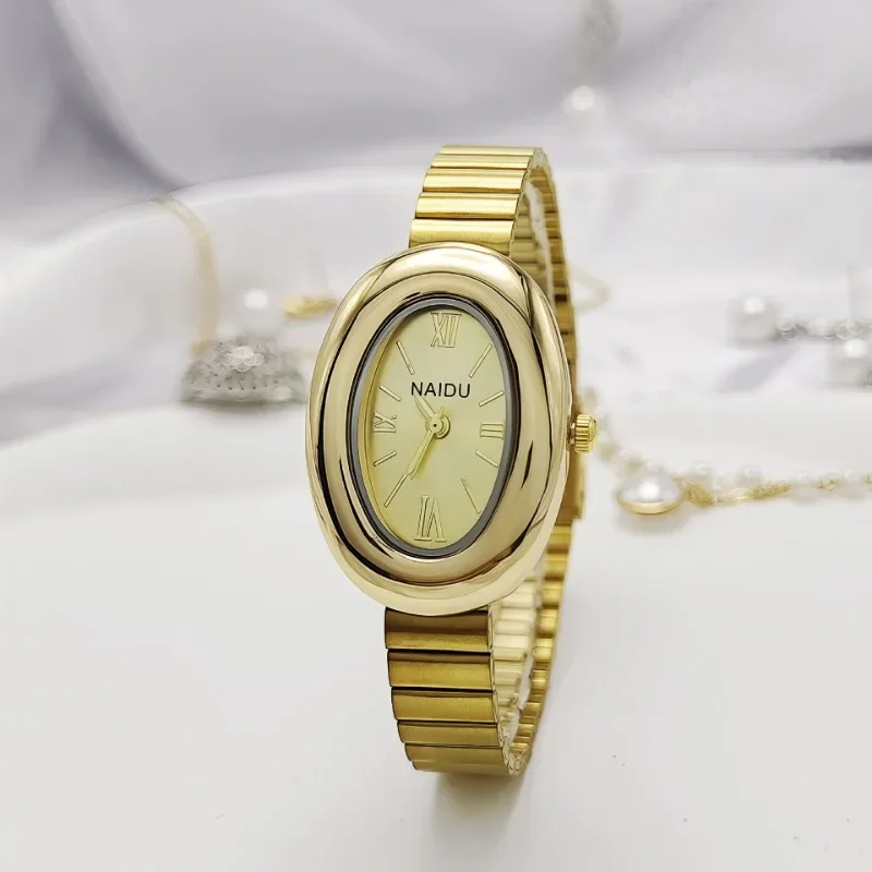 Nuovo orologio al quarzo da donna di fascia alta Orologio ovale in oro di lusso Orologio in acciaio inossidabile Orologio da donna Moglie Regalo di Natale