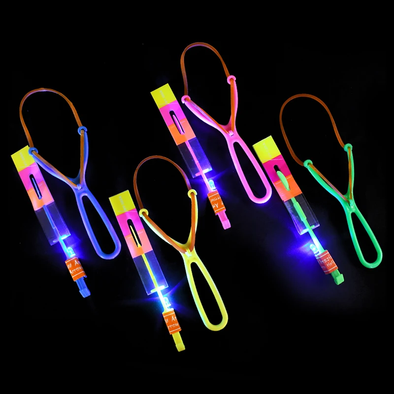 5/10/20pcs HA CONDOTTO LA Luce Freccia Razzo Elicottero Volante Giocattoli Per Bambini Festa Di Compleanno Bomboniere Sacchetto Regalo Pinata Riempitivi Elastico Catapulta