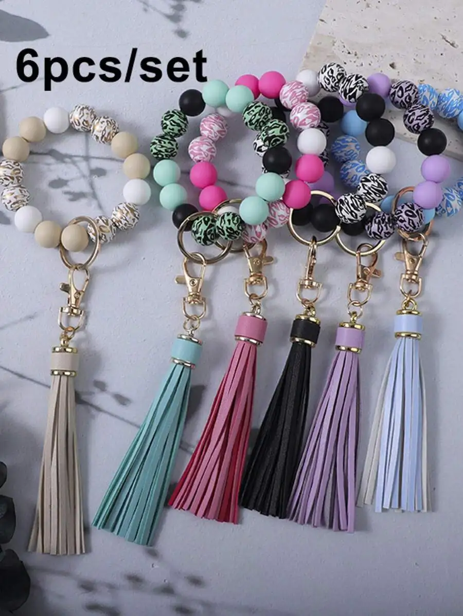 

6pcs Silicone Bead Keychains With PU Tassels Wrist Bag Charm For Women