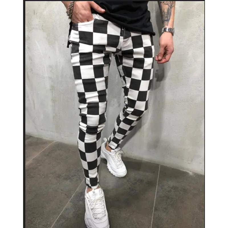 Nuovi pantaloni Casual a quadri bianchi neri da uomo 2024 pantaloni sportivi da jogging moda autunno pantaloni Skinny da uomo pantaloni da uomo Ropa Hombre