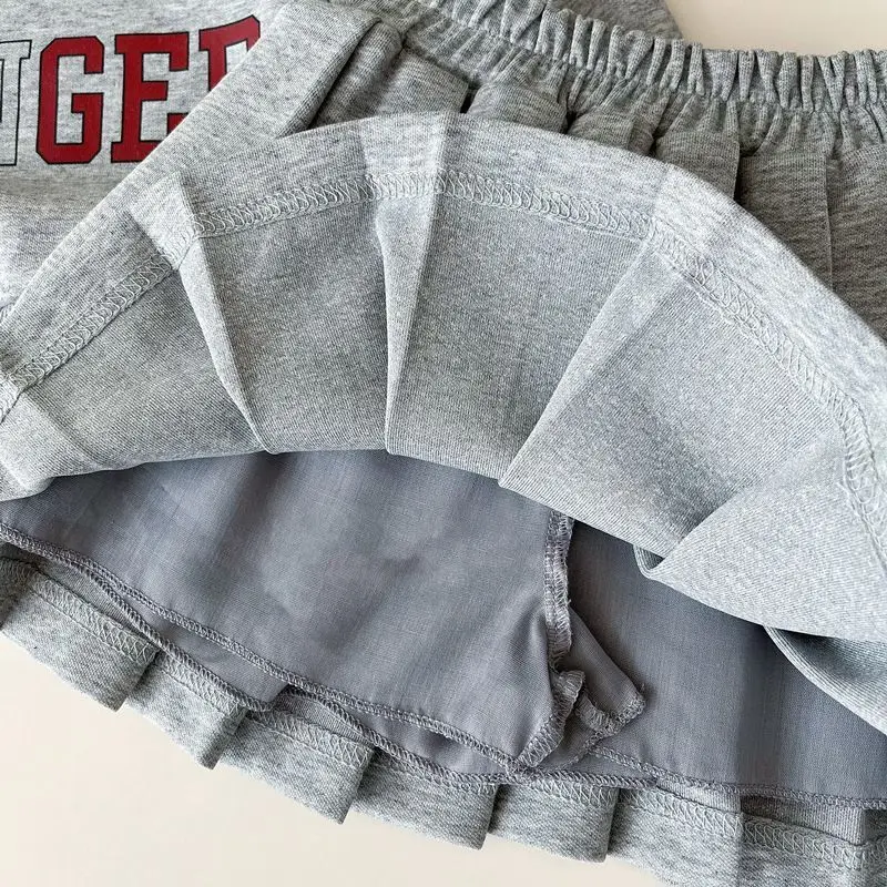 Abbigliamento per neonate Top stampato + gonna a pieghe Set 2 pezzi Abiti Set di vestiti alla moda per bambini 2-7 anni