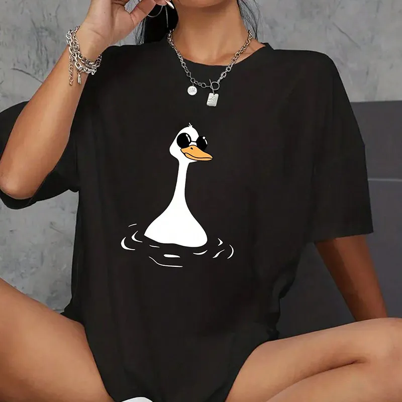 T-shirt décontracté à manches courtes et col rond pour femme, imprimé graphique canard mignon avec lunettes tendance, design ludique et confortable, idéal pour l'été