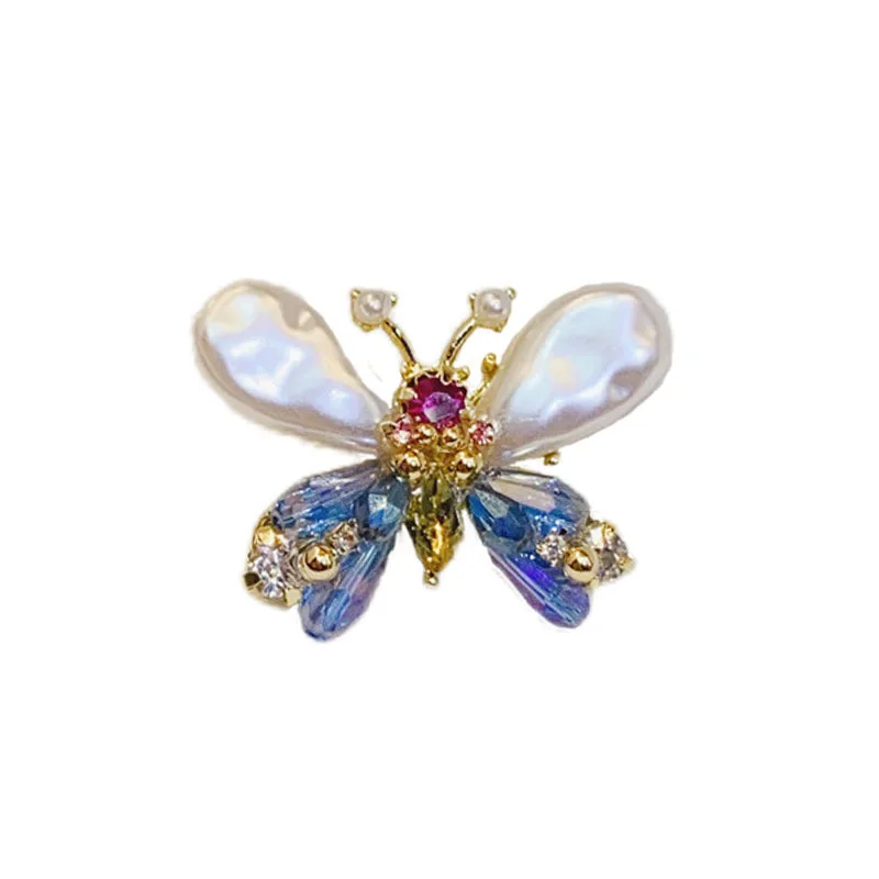 

Elegant white butterfly brooch, gold-plated crystal diamond-set fixed buckle, small collar pin, women's accessories.