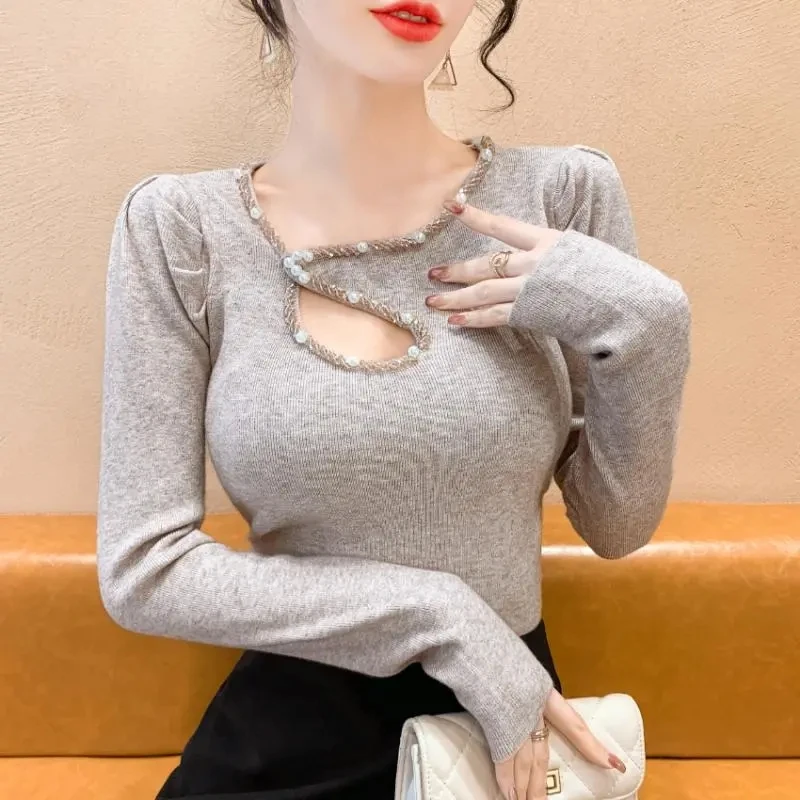 Damestrui Lente en herfst V-hals Holle nagelboor Leuke naald Mode Dieptepunt Shirt Trui Blouse Dameskleding