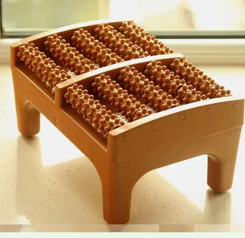 

Domestic foot massager foot acupuncture point massage cushion plastic wooden roller foot massager a foot stool