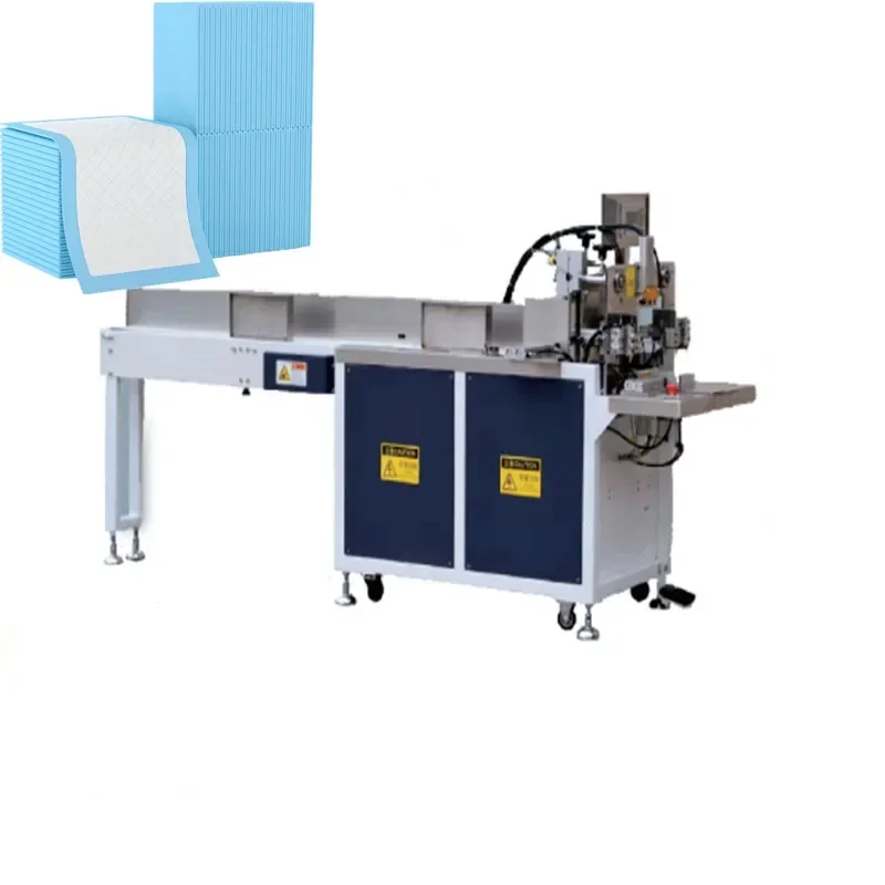 YYHClow cost full automatic Disposable bed sheets/examination table sheets/ Sanitary pads packing machine