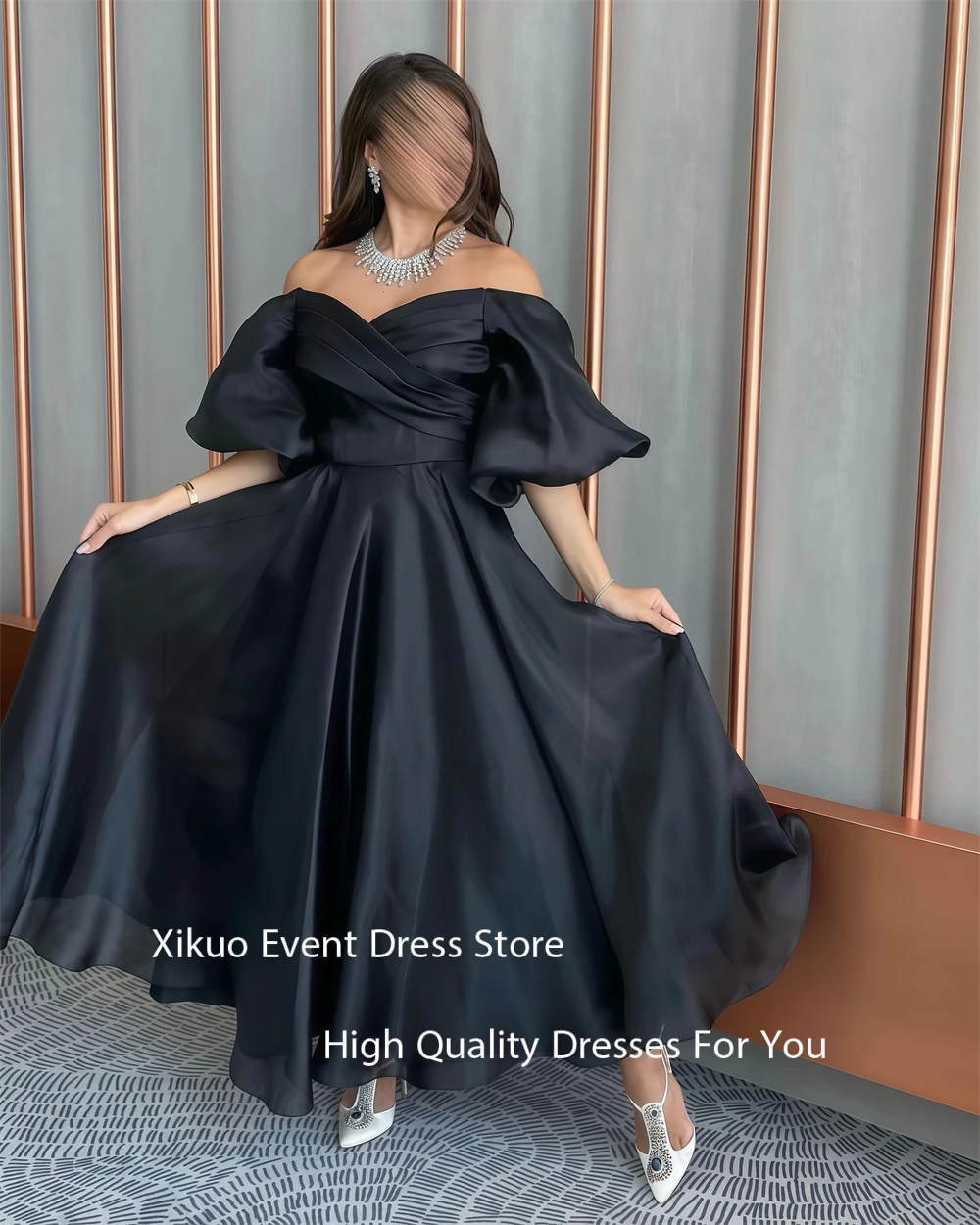 فستان سهرة أنيق من الأورجانزا باللون الأسود من Xikuo في المملكة العربية السعودية بدون حمالات رداء حفلات بأكمام منتفخة على شكل حرف A فساتين المشاهير حسب الطلب