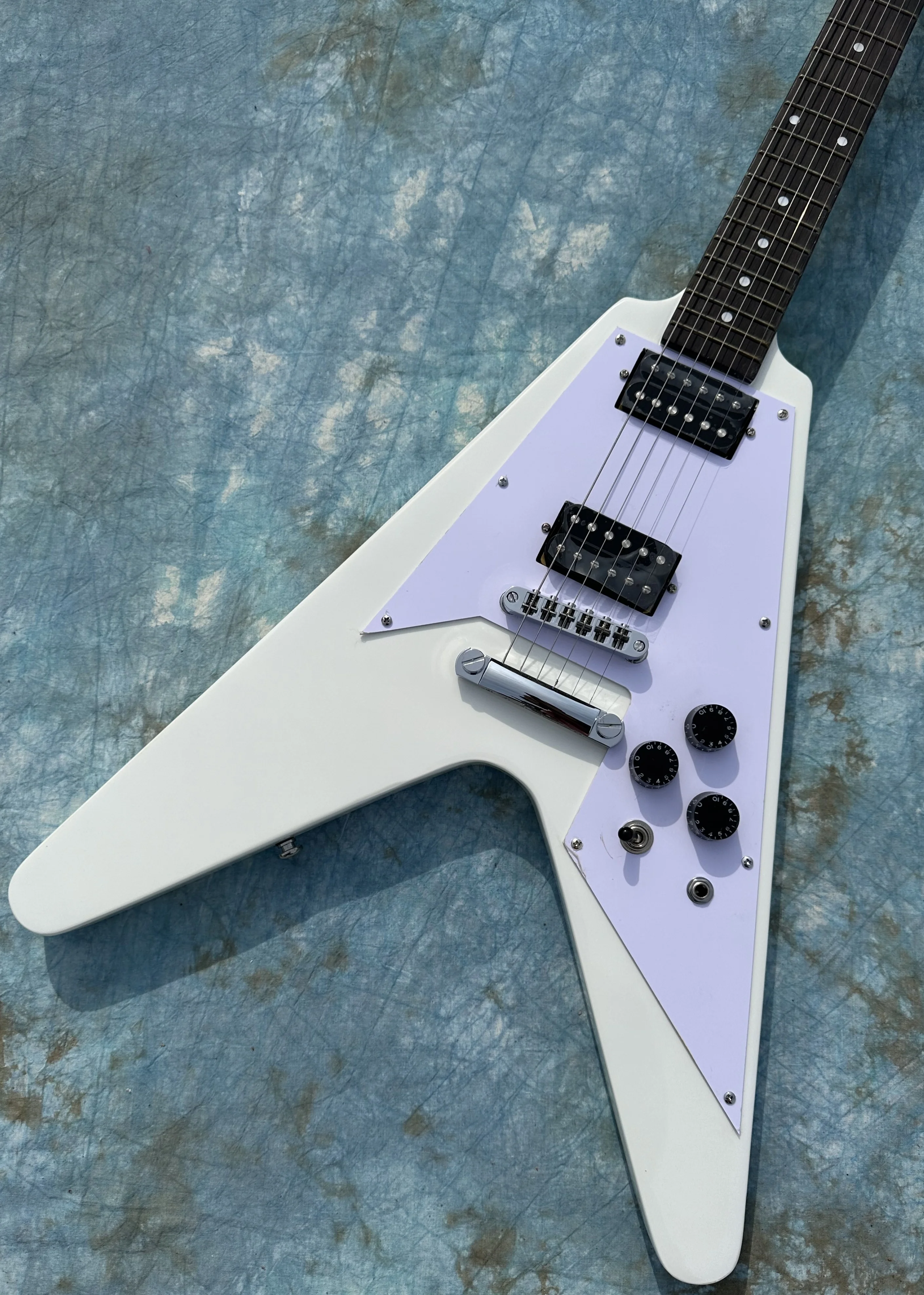 Irregular electric guitar, white flying V, black open pickup, imported wood and paint, shiny, in stock, fast shipping