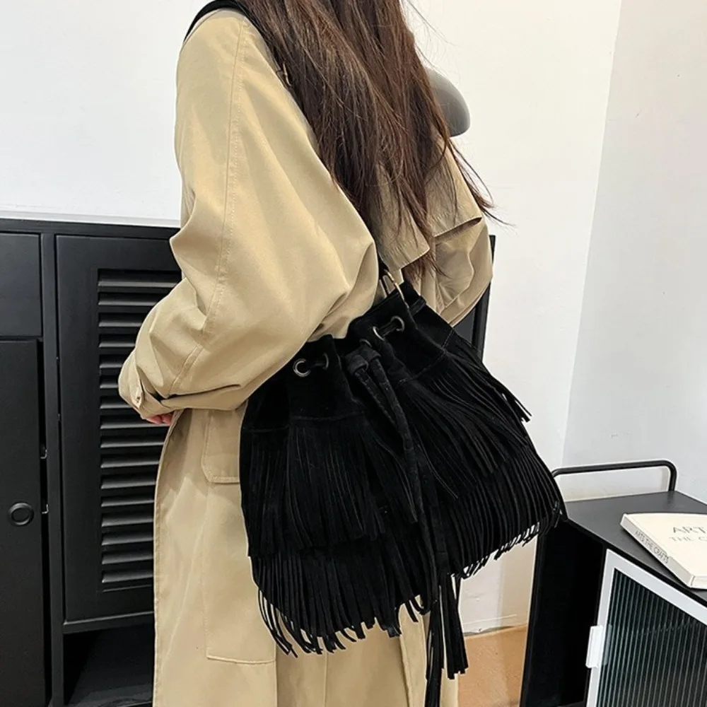 

Korean Style Tassel Shoulder Bag Solid Color Large Capacity Suede Handbag PU Leather Bohemian Style Drawstring Bucket Bag
