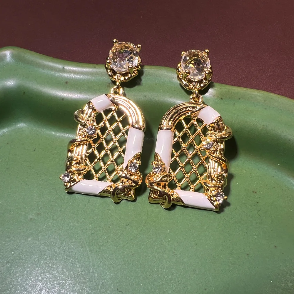 Internet celebrity explosion bird cage earrings, light luxury niche design sense French high sense S925 plated real gold earring