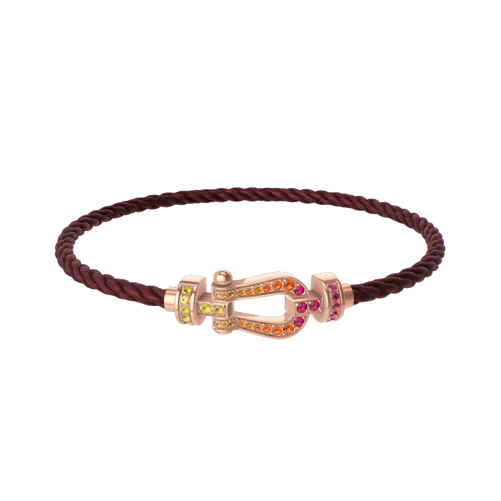 

A horseshoe-shaped bracelet set with colorful diamonds, paired with a brightly colored string, size M