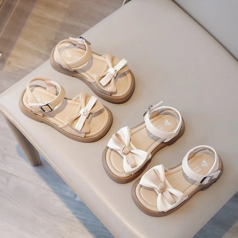 

Girls' Sandals 2024 Summer Korean Edition New Little Girl Bow Princess Sandals Baby Soft Sole Casual Shoes Trend 1566