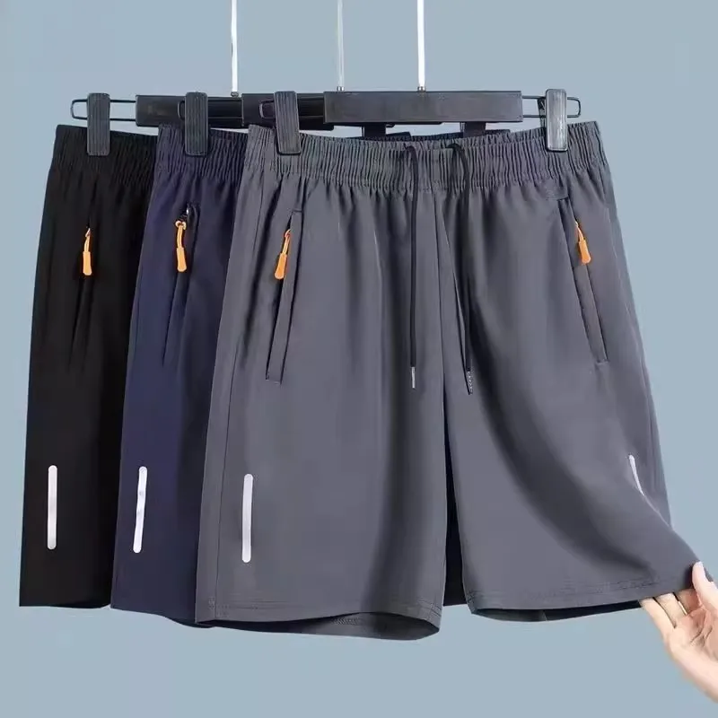 Pantaloni estivi sottili e traspiranti in seta di ghiaccio da uomo che corrono casual larghi quattro quanti di lunghezza pantaloni medi gamba dritta colore puro