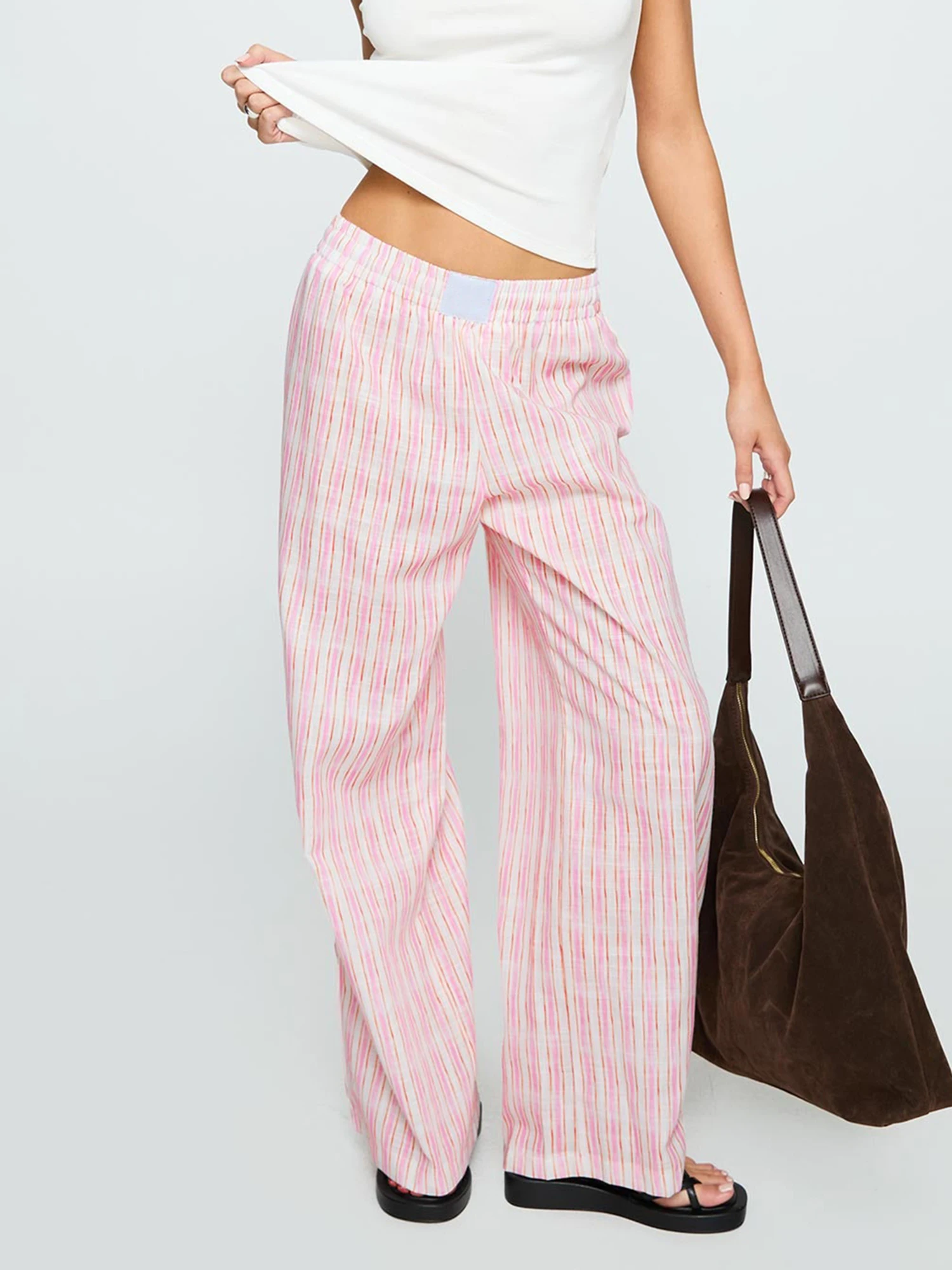 กางเกงทรงพอดีตัวพิมพ์ลายสก๊อตของผู้หญิงพร้อมสายรัดเอวปรับได้สําหรับตัวเลือกการจัดแต่งทรงผมที่หลากหลายตลอดทั้งปี