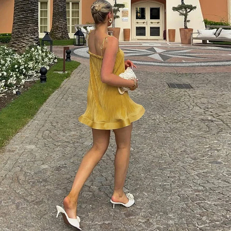 ชุดเดรสสั้นเซ็กซี่แบบไม่มีแขนและสายเดี่ยว แฟชั่นสำหรับผู้หญิง ชุดเดรสหลวมๆ สำหรับวันหยุดพักผ่อนที่ชายหาด ชุดเดรสสั้นสำหรับงานปาร์ตี้ฤดูร้อน สไตล์โบฮีเมียน