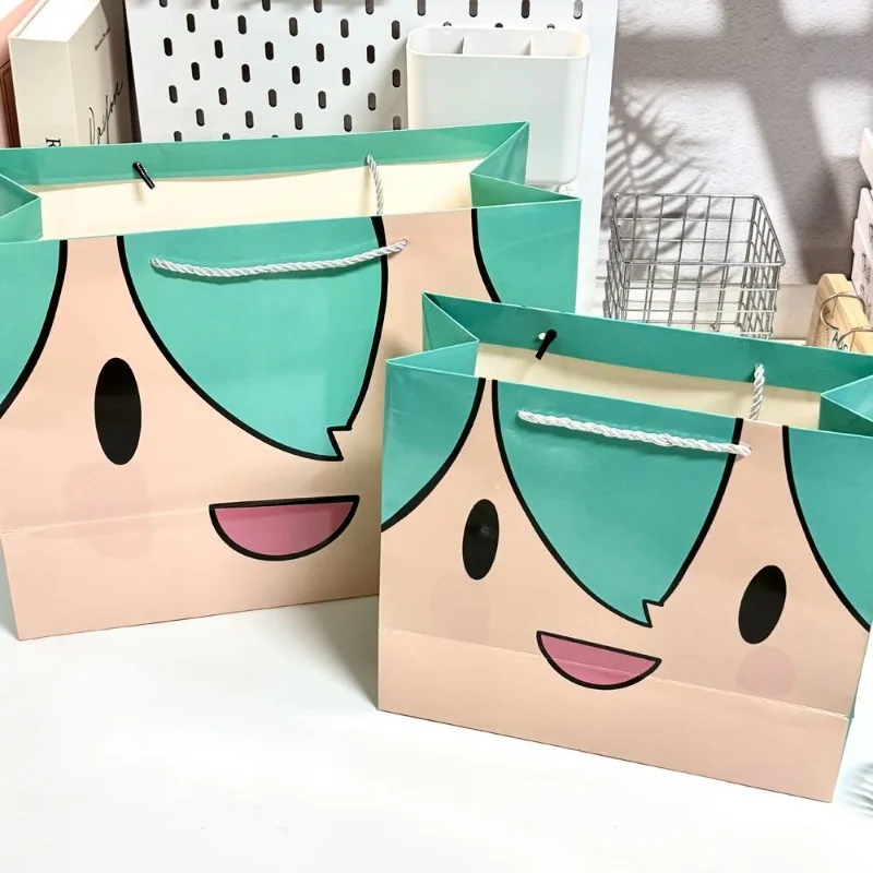 Hatsune Miku bolsa de regalo de dibujos animados lindo compras bidimensionales de gran capacidad portátil regalo de cumpleaños bolsa de embalaje hecha a mano