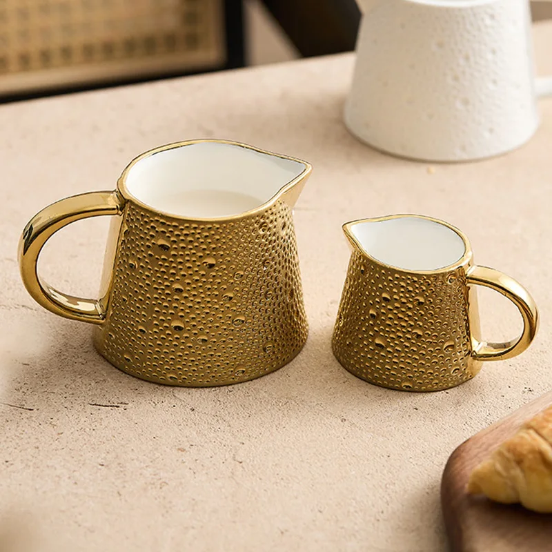 

Керамический кувшин для молока Кувшин для молока Бытовая чашка для отвода воды Отель Западная еда Соус Чашка для сока Размер Метеоритный душ Кофе Чашка для молока Керамическая