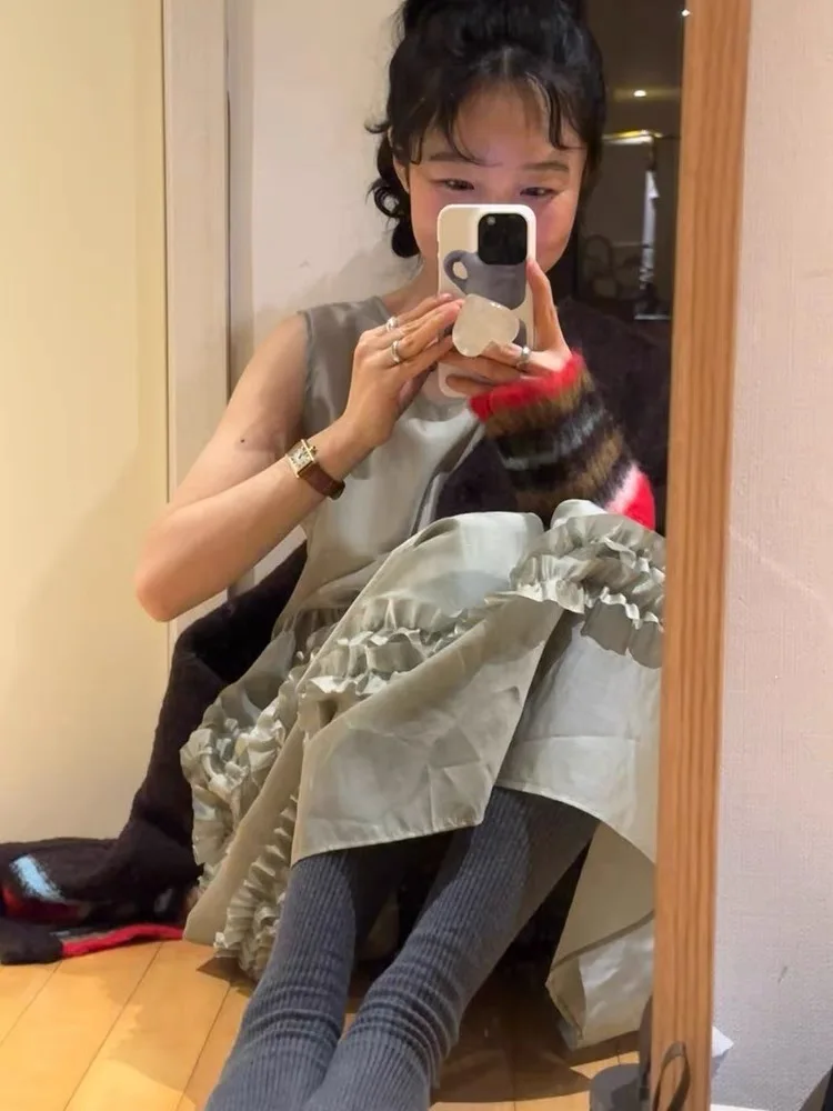 Estilo coreano primavera e verão nova borda fungo versátil bolo colete saia longa