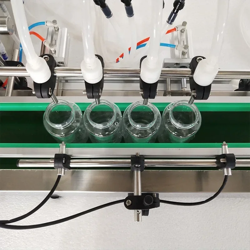 Para linha de montagem automática de quatro cabeças máquina de enchimento controle numérico líquido quantitativo máquina de enlatamento licor essencial