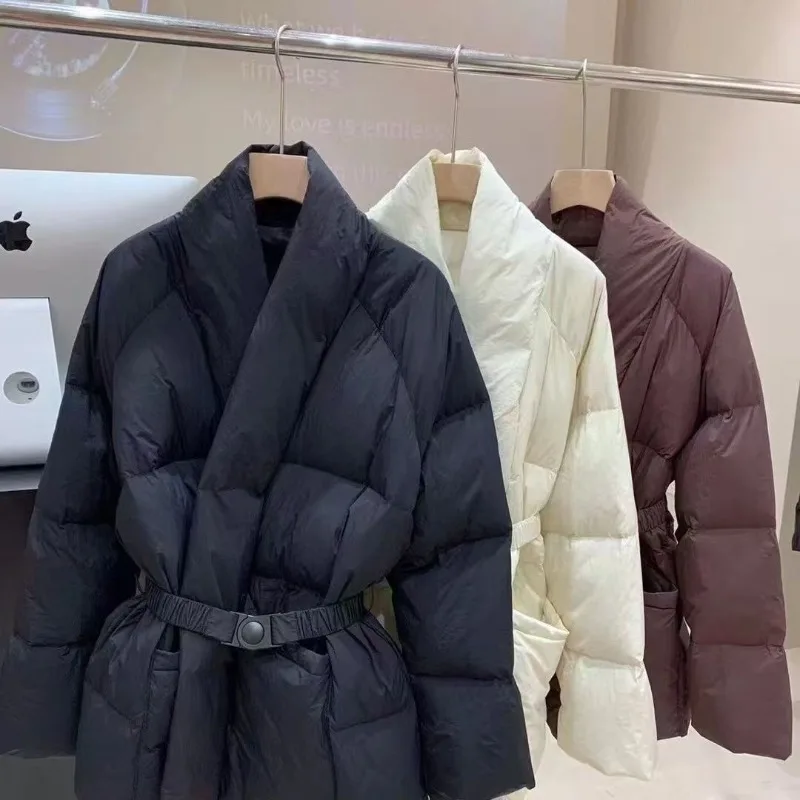 Preto para baixo roupas de algodão feminino med e longo inverno nova versão coreana rendas cintura jaqueta grossa para manter quente com decote em v parkas