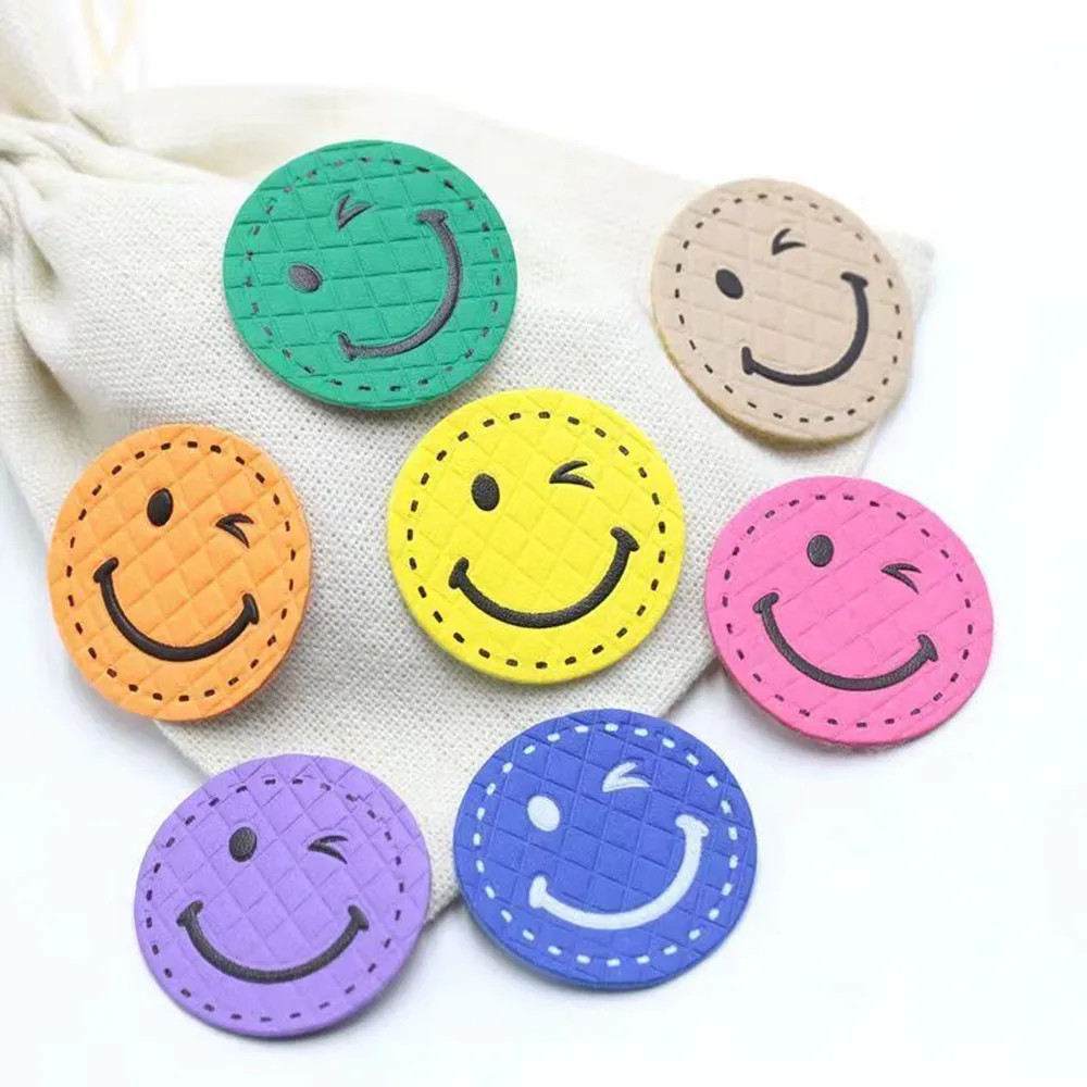 20Pcs/Lot Smiley face label fluorescent PU leather label back label Handdade DIY accessories cloth sticker for clothes bags