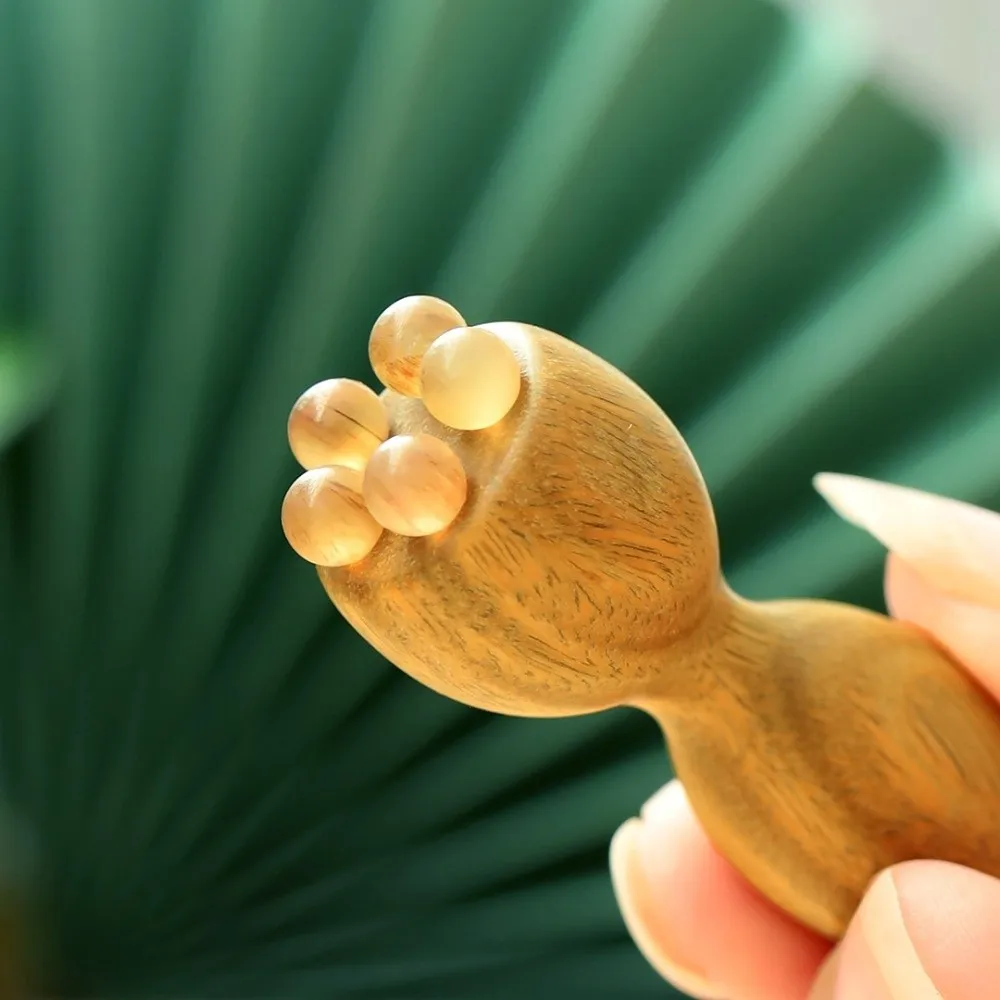 

Five Beads Design Sandalwood Lotus Seedpod Massager Reduce Puffiness Face Lifting and Tightening Eye Massage Stick