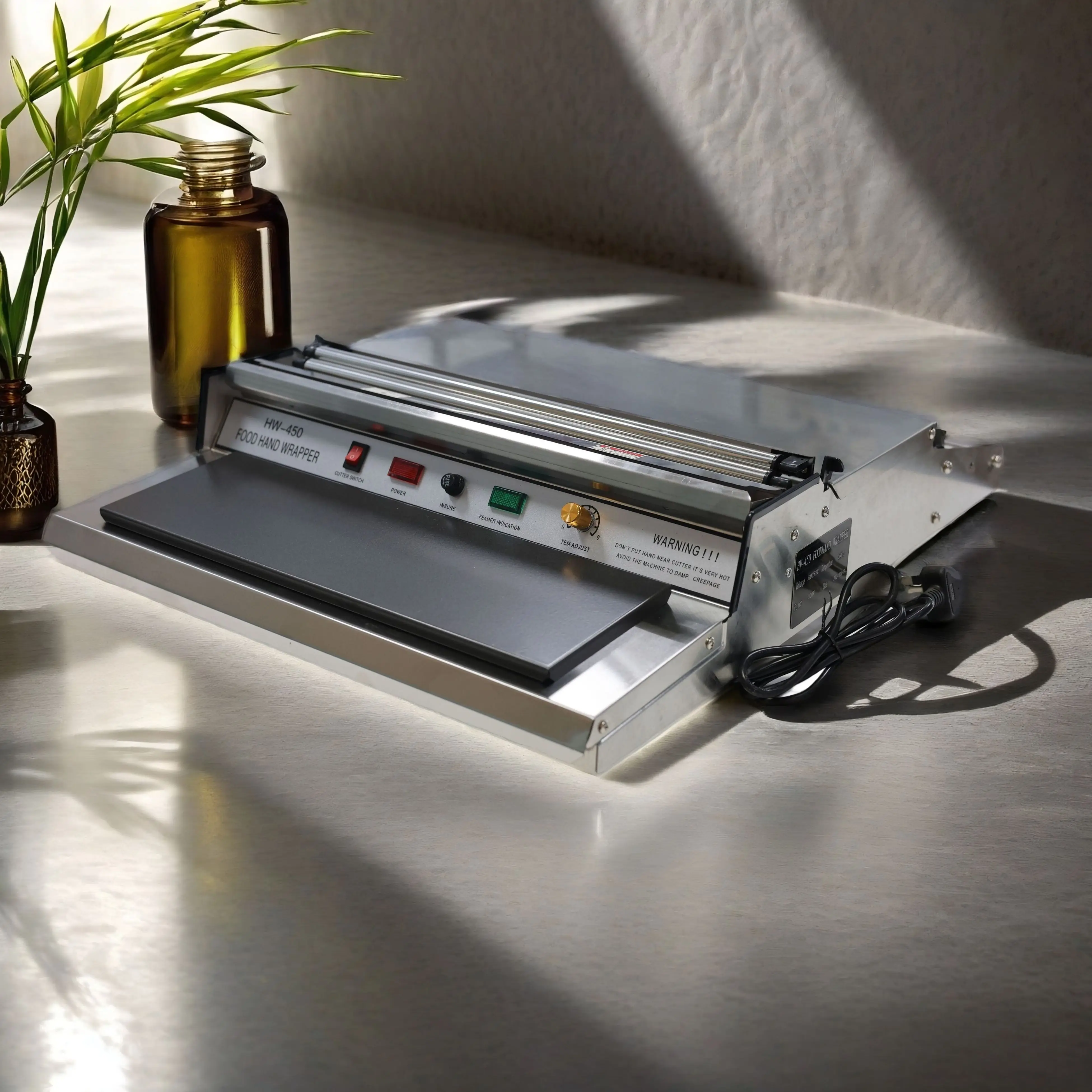 HW-450 سوبر ماركت متجر الفاكهة التعبئة والتغليف والحفاظ على فيلم ختم آلة قطع الحفاظ على آلة تغليف الفيلم